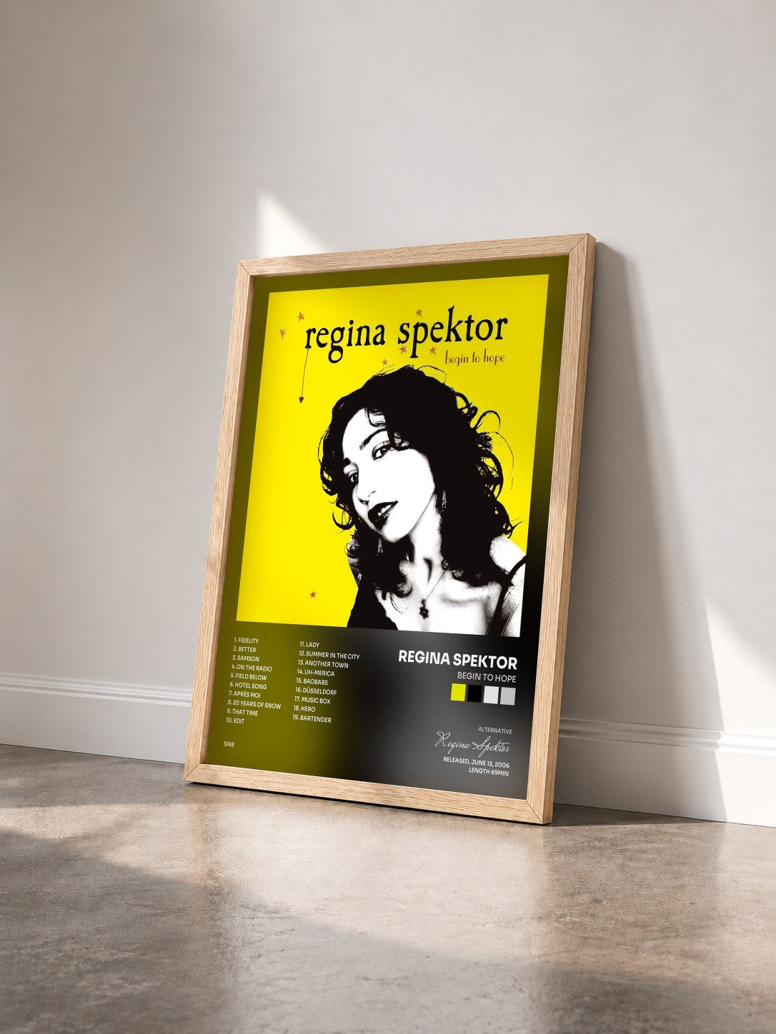 #bois Tableau de l'album Begin to Hope de Regina Spektor vu de trois quarts, cadre en bois brut