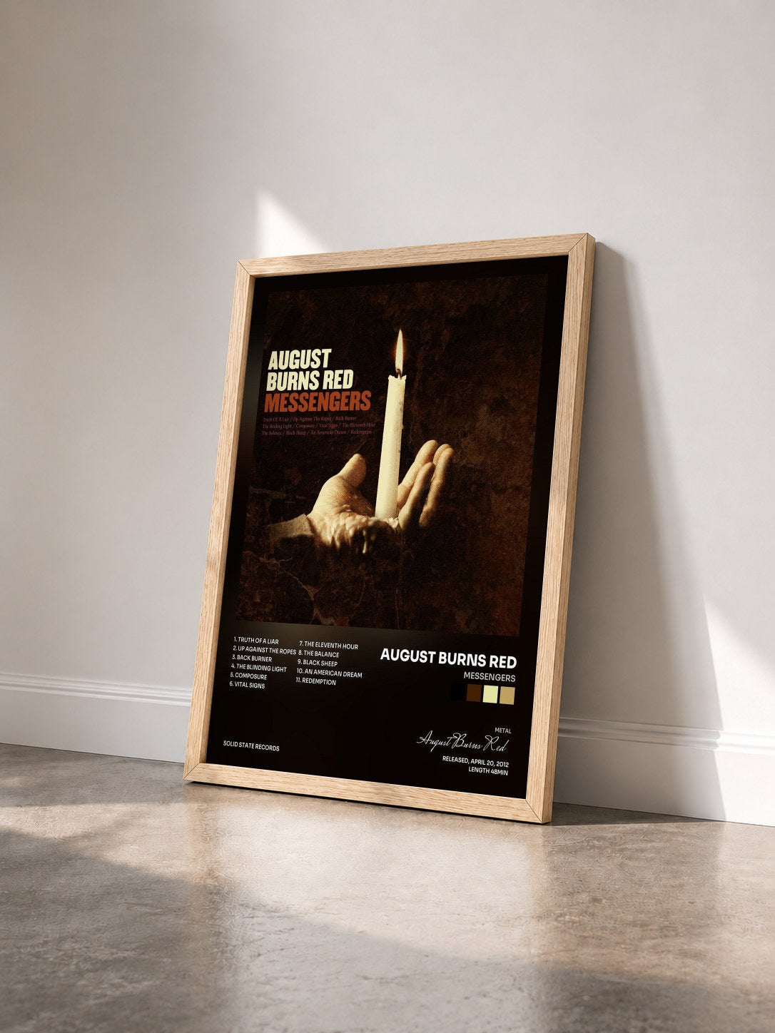 #bois Tableau de l'album Messengers de August Burns Red vu de trois quarts, cadre en bois brut