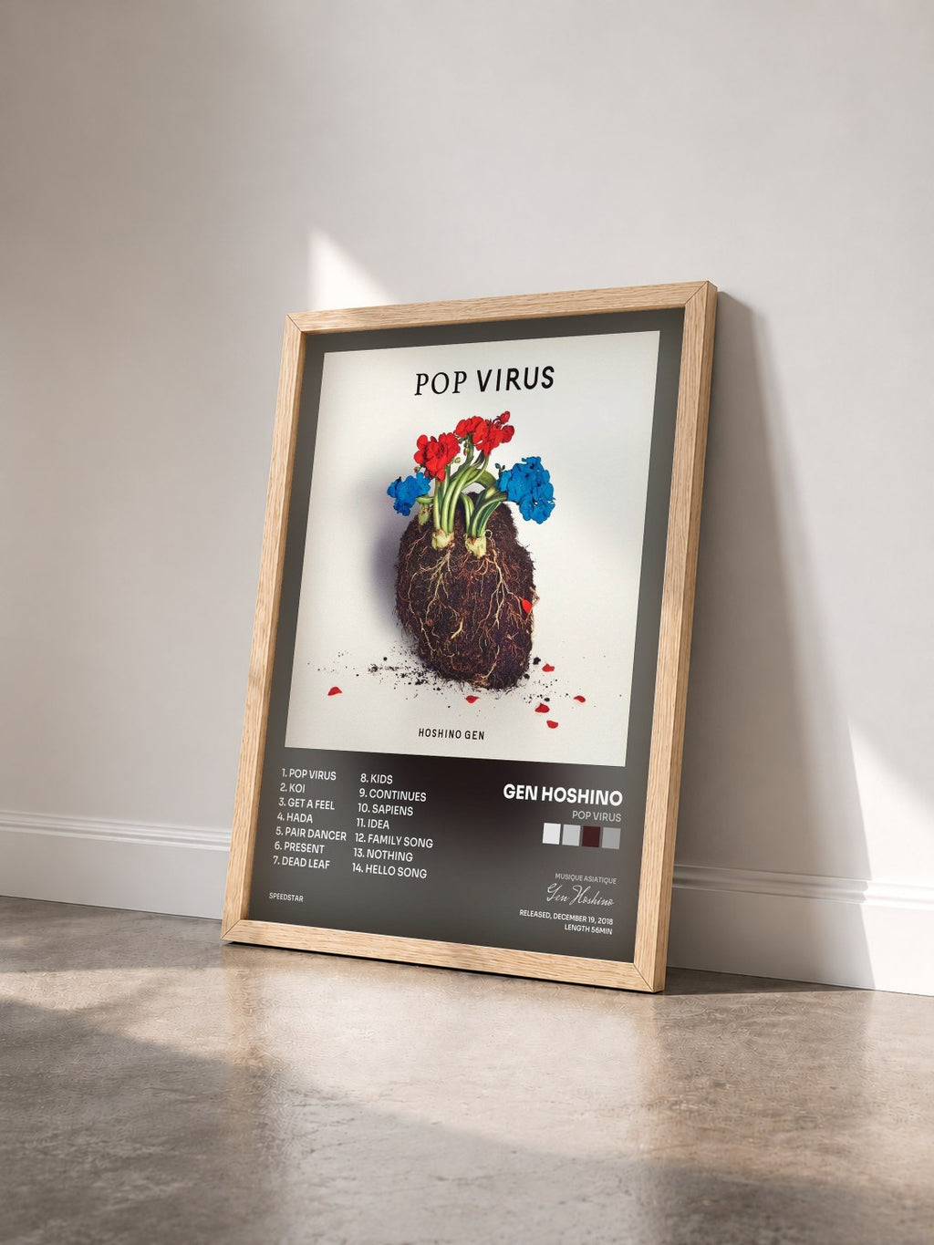 #bois Tableau de l'album POP VIRUS de Gen Hoshino vu de trois quarts, cadre en bois brut