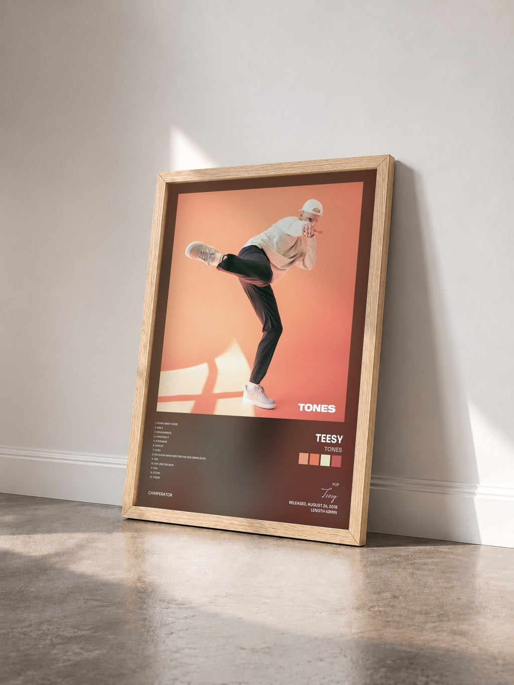 #bois Tableau de l'album Tones de Teesy vu de trois quarts, cadre en bois brut