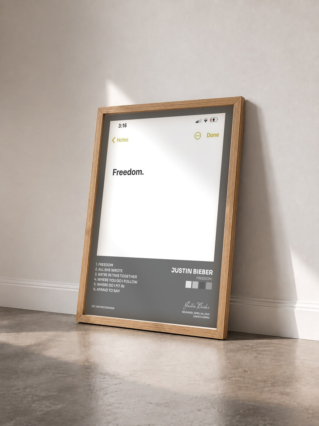 #bois Tableau de l'album Freedom. de Justin Bieber vu de trois quarts, cadre en bois brut