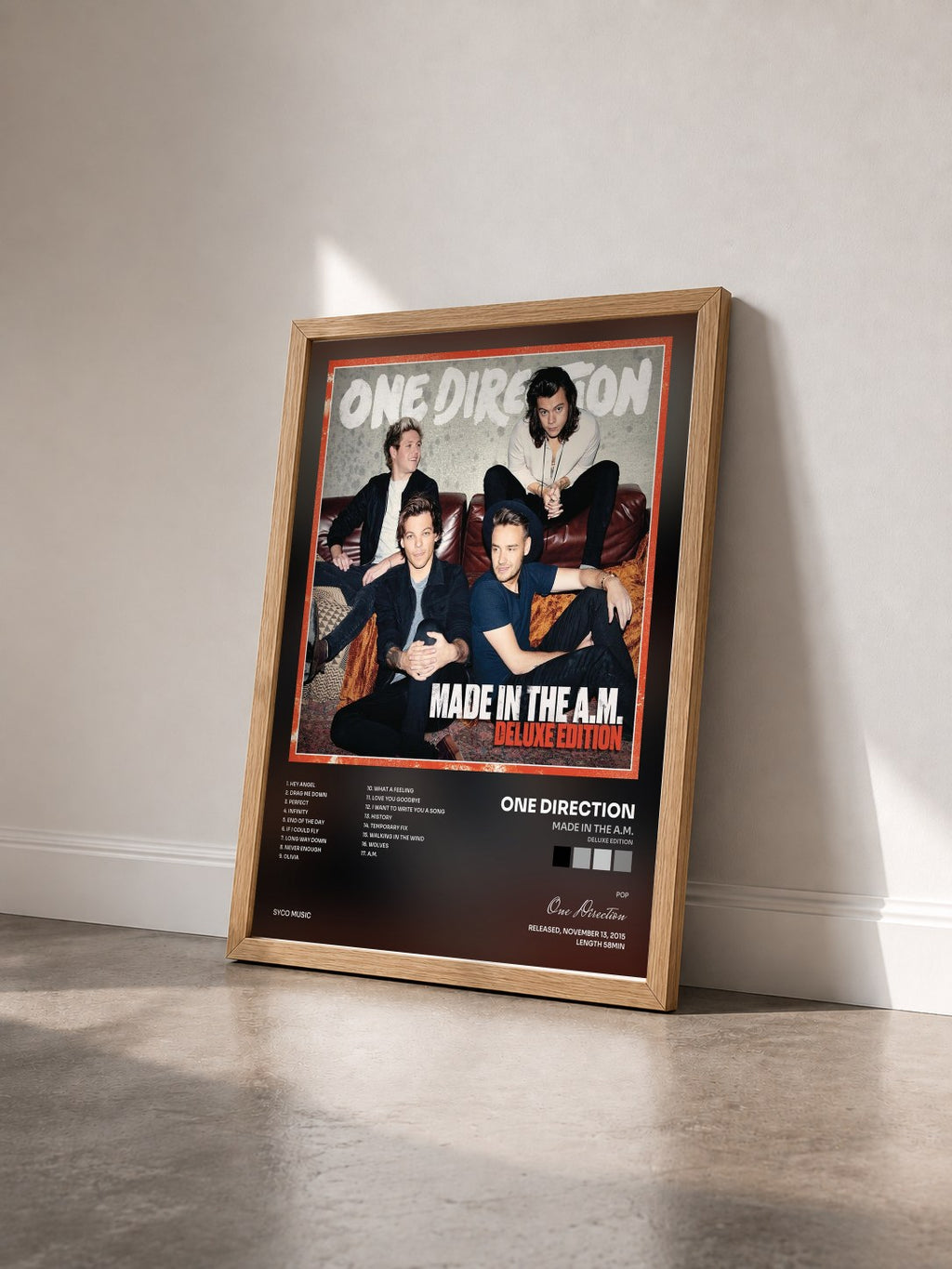 #bois Tableau de l'album Made In The A.M. (Deluxe Edition) de One Direction vu de trois quarts, cadre en bois brut