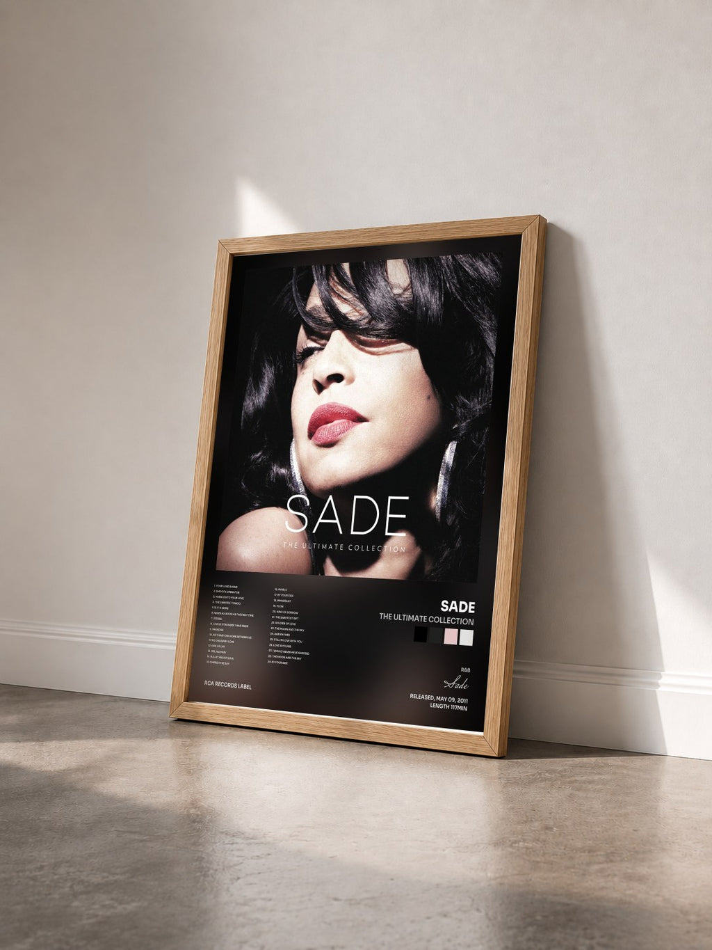 #bois Tableau de l'album The Ultimate Collection de Sade vu de trois quarts, cadre en bois brut