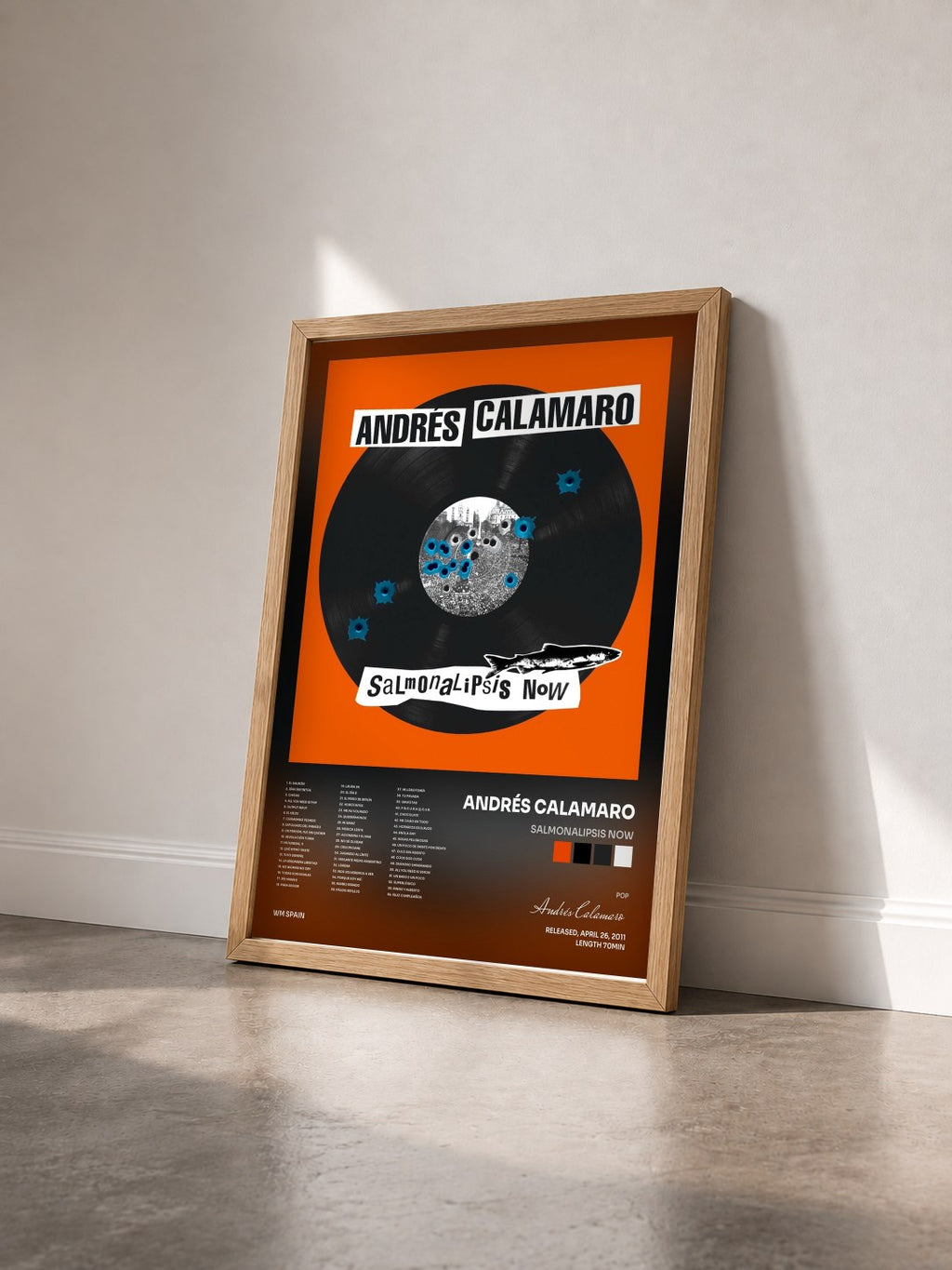 #bois Tableau de l'album Salmonalipsis now de Andrés Calamaro vu de trois quarts, cadre en bois brut