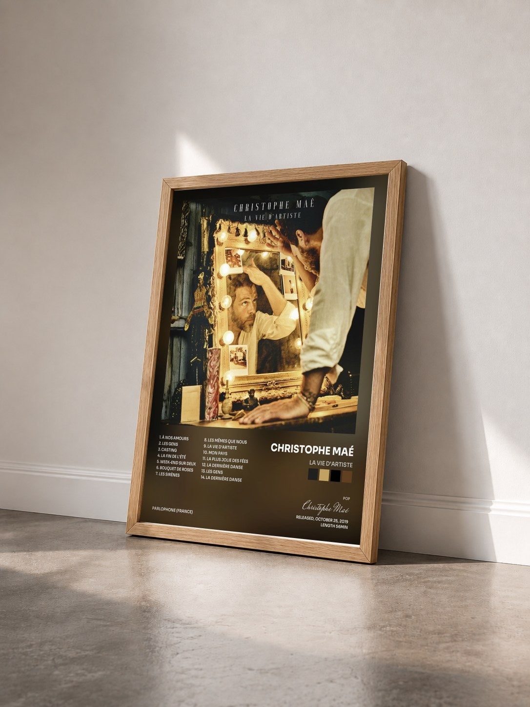 #bois Tableau de l'album La vie d'artiste de Christophe Maé vu de trois quarts, cadre en bois brut