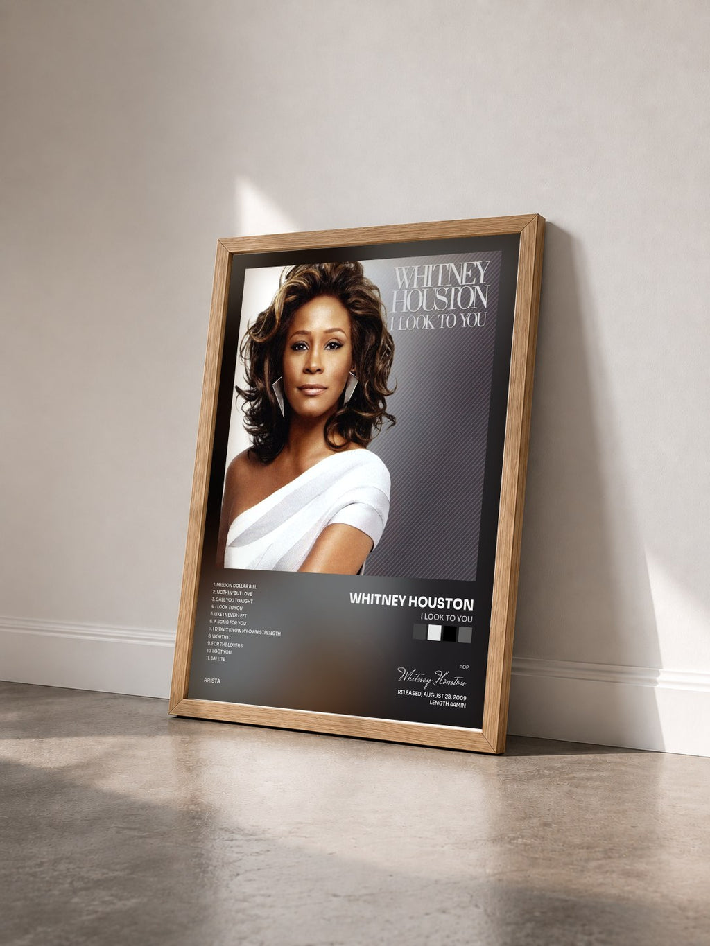 #bois Tableau de l'album I Look To You de Whitney Houston vu de trois quarts, cadre en bois brut