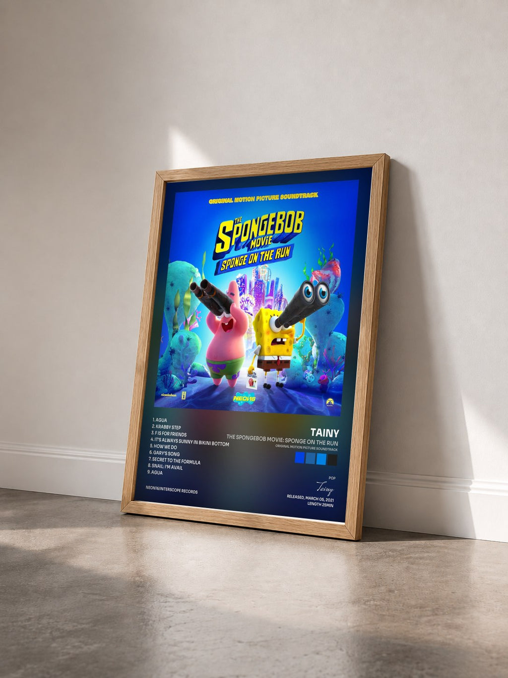 #bois Tableau de l'album The SpongeBob Movie: Sponge On The Run (Original Motion Picture Soundtrack) de Tainy vu de trois quarts, cadre en bois brut