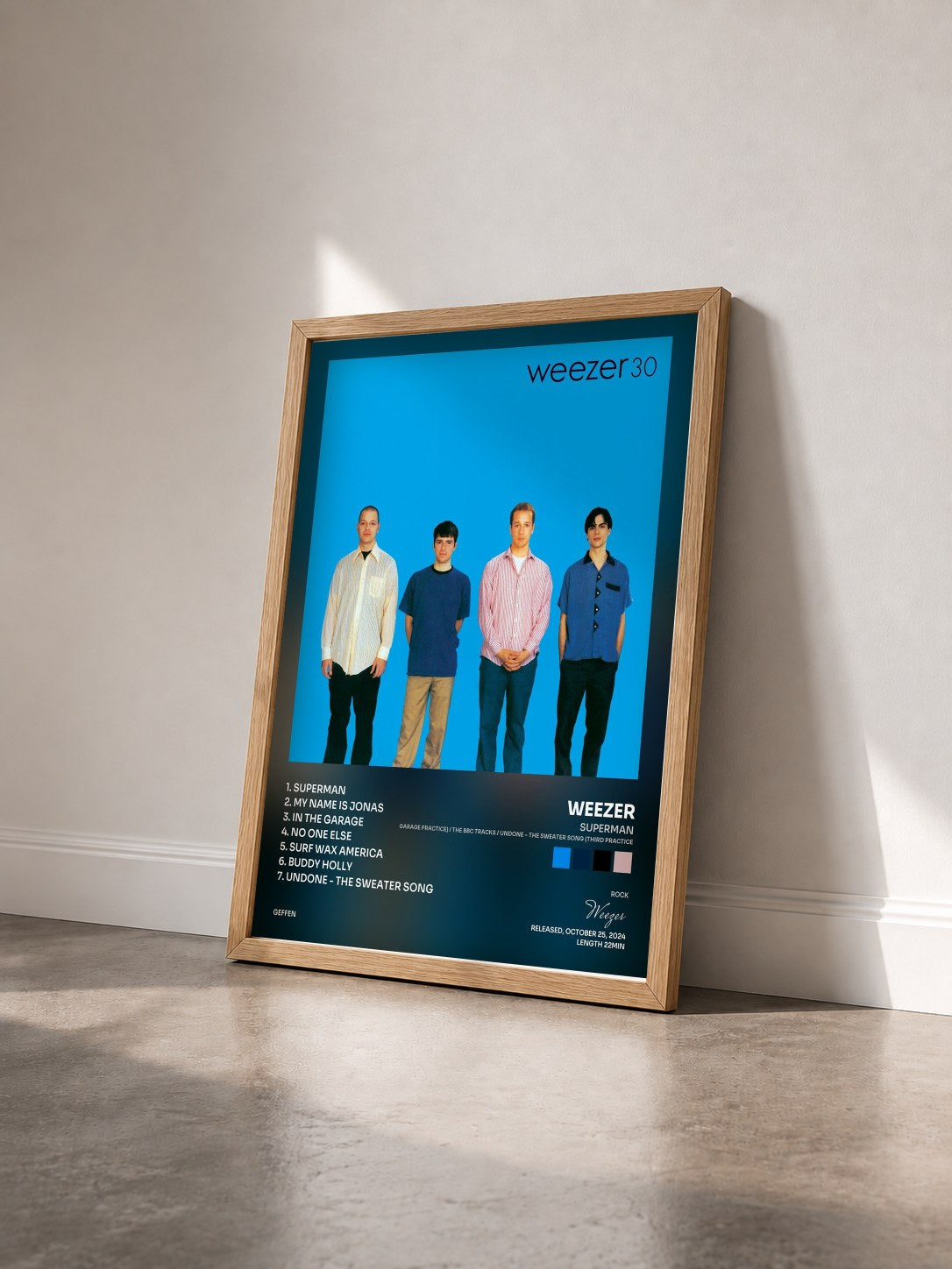 #bois Tableau de l'album Superman (Garage Practice) / The BBC Tracks / Undone – The Sweater Song (Third Practice) de Weezer vu de trois quarts, cadre en bois brut