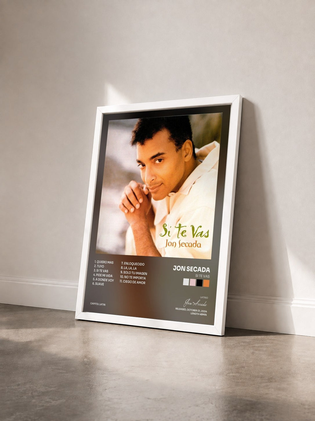 #blanc Tableau de l'album Si Te Vas de Jon Secada vu de trois quarts, cadre blanc
