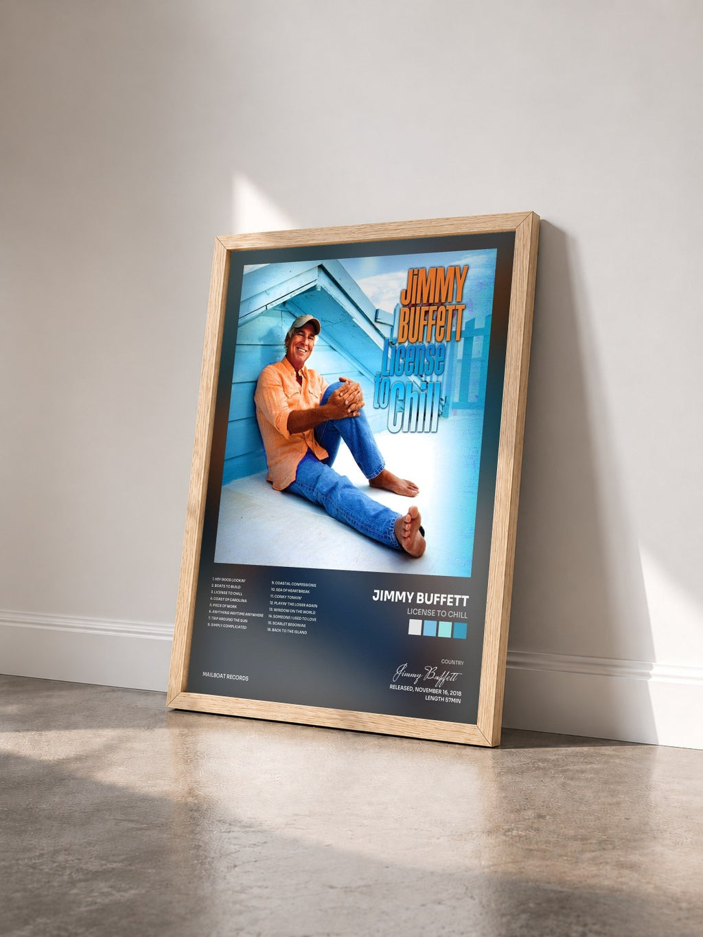 #bois Tableau de l'album License to Chill de Jimmy Buffett vu de trois quarts, cadre en bois brut