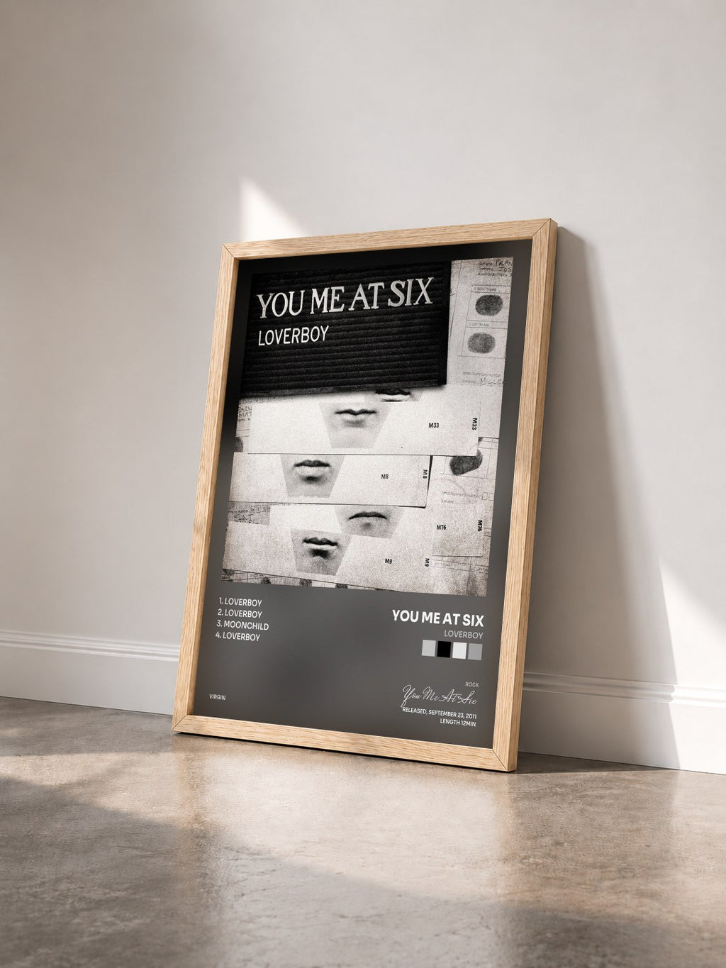 #bois Tableau de l'album Loverboy de You Me At Six vu de trois quarts, cadre en bois brut