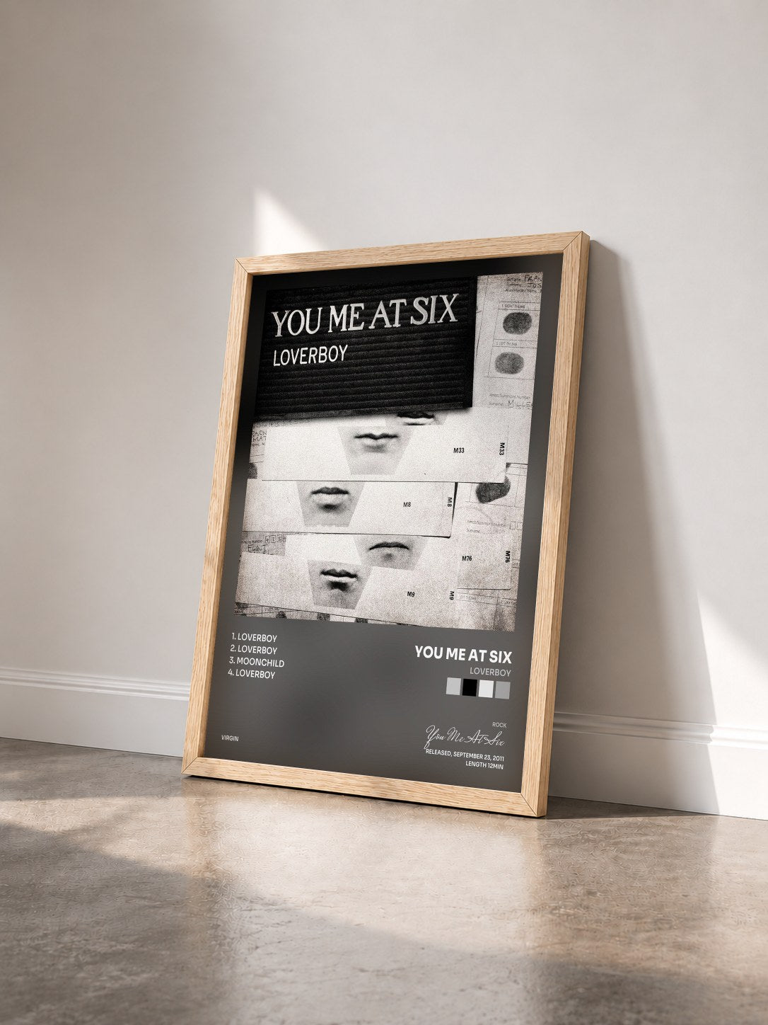 #bois Tableau de l'album Loverboy de You Me At Six vu de trois quarts, cadre en bois brut