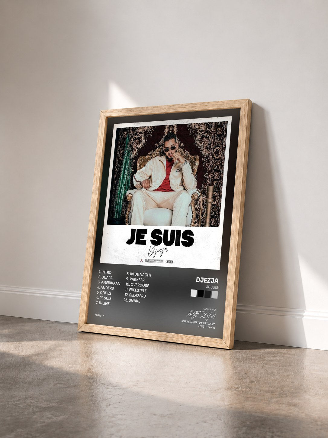 #bois Tableau de l'album Je Suis de DJEZJA vu de trois quarts, cadre en bois brut
