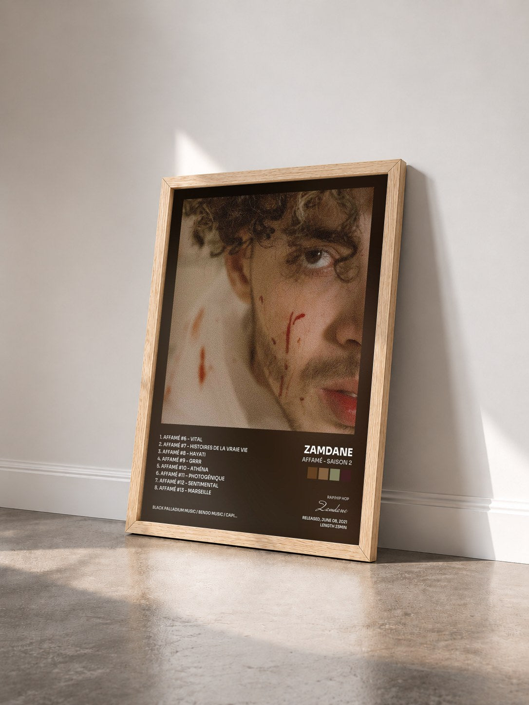 #bois Tableau de l'album Affamé - Saison 2 de Zamdane vu de trois quarts, cadre en bois brut