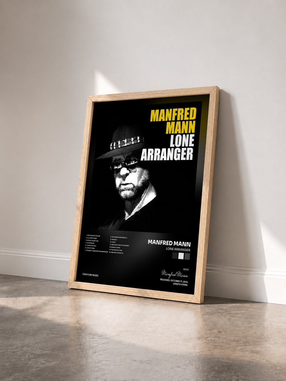 #bois Tableau de l'album Lone Arranger de Manfred Mann vu de trois quarts, cadre en bois brut