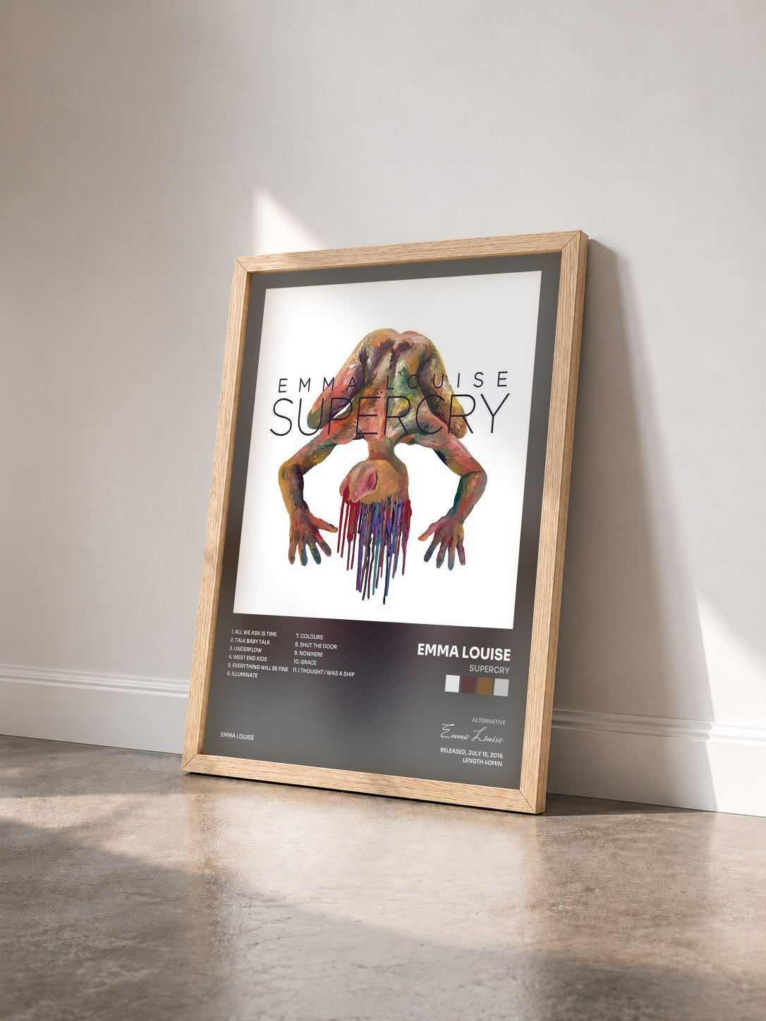 #bois Tableau de l'album Supercry de Emma Louise vu de trois quarts, cadre en bois brut