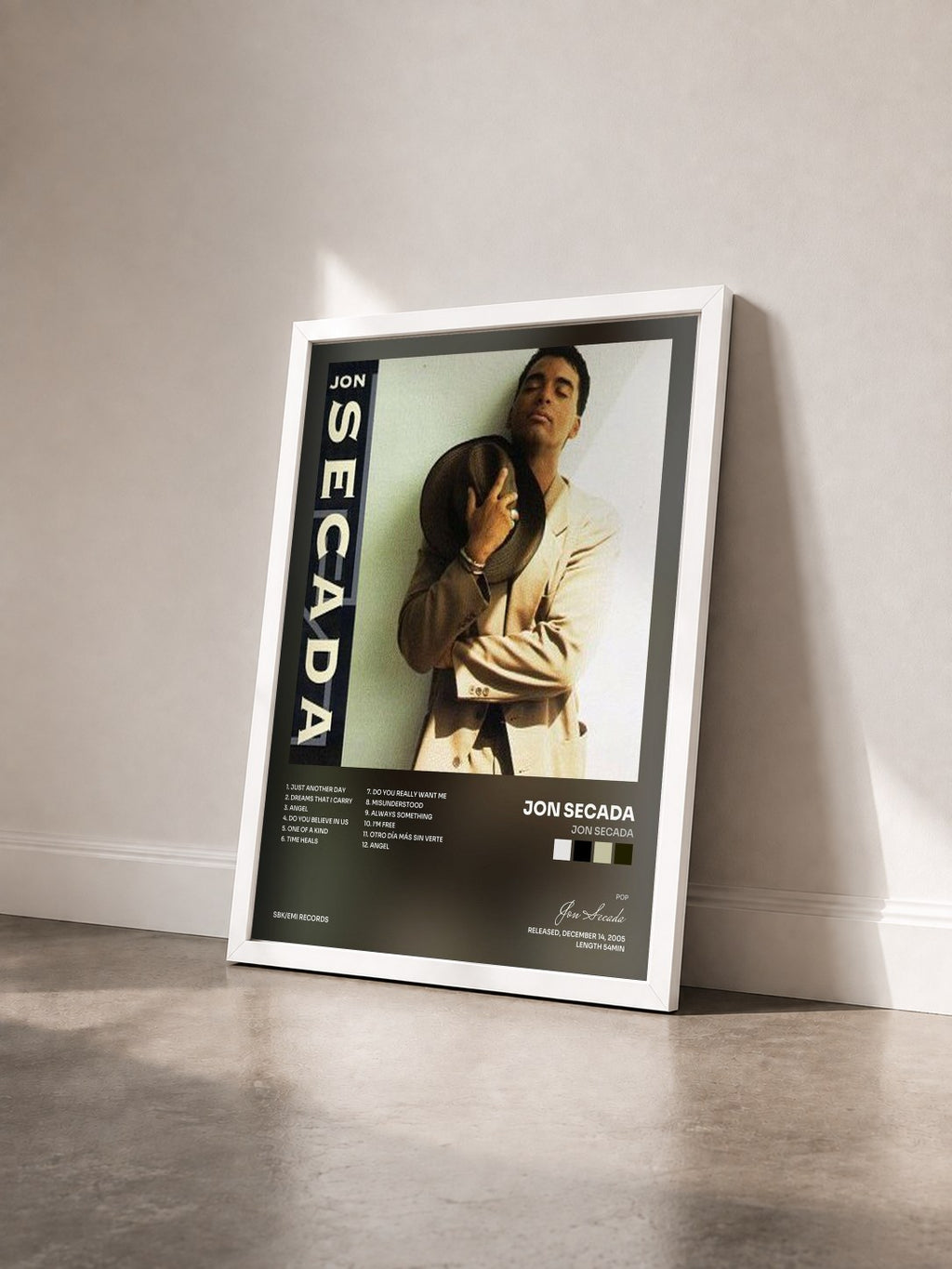 #blanc Tableau de l'album Jon Secada de Jon Secada vu de trois quarts, cadre blanc