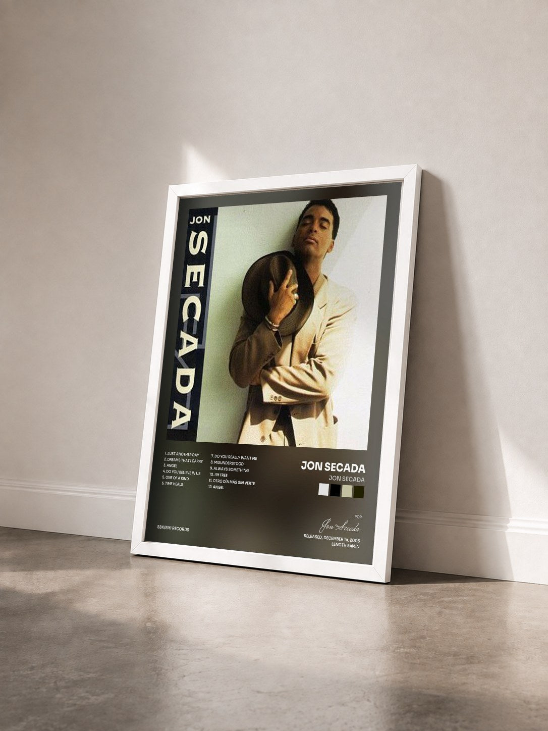 #blanc Tableau de l'album Jon Secada de Jon Secada vu de trois quarts, cadre blanc
