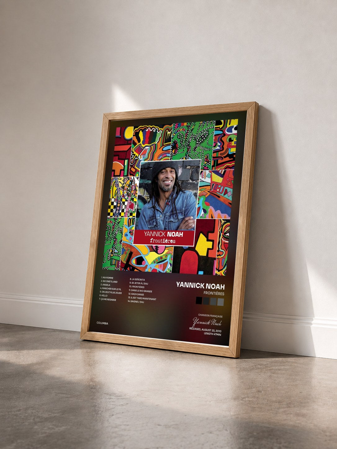 #bois Tableau de l'album Frontières de Yannick Noah vu de trois quarts, cadre en bois brut