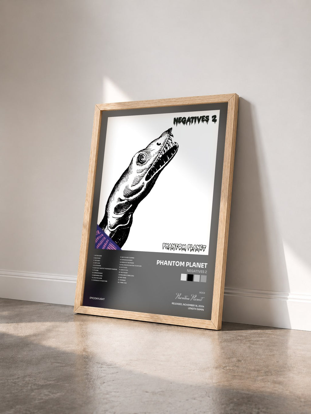 #bois Tableau de l'album Negatives 2 de Phantom Planet vu de trois quarts, cadre en bois brut