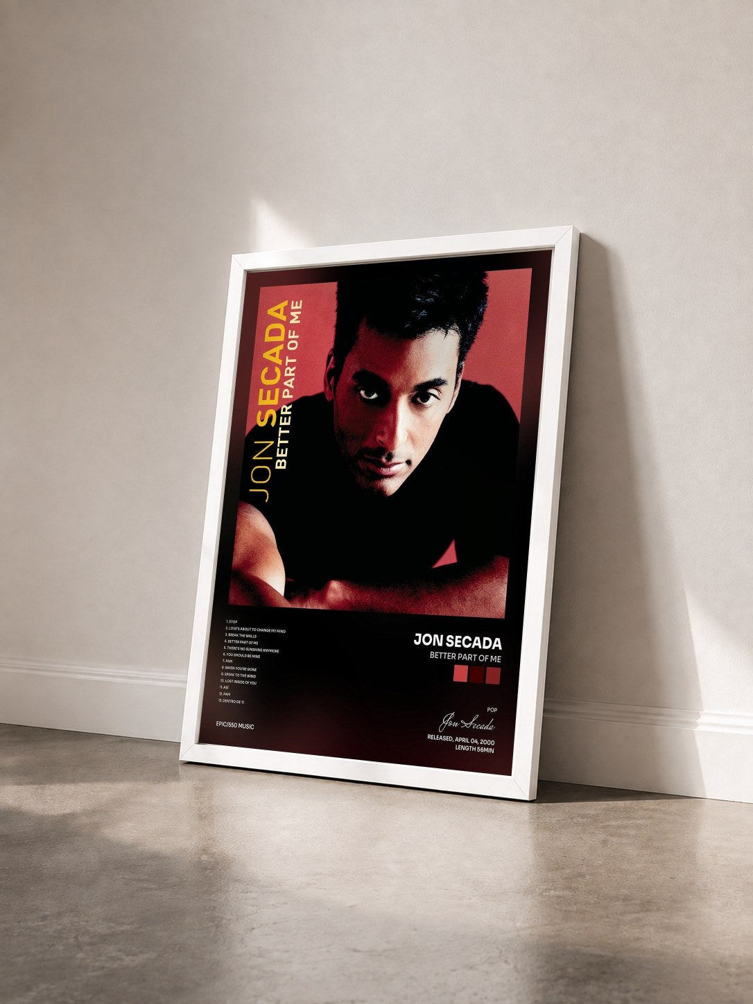 #blanc Tableau de l'album Better Part Of Me de Jon Secada vu de trois quarts, cadre blanc