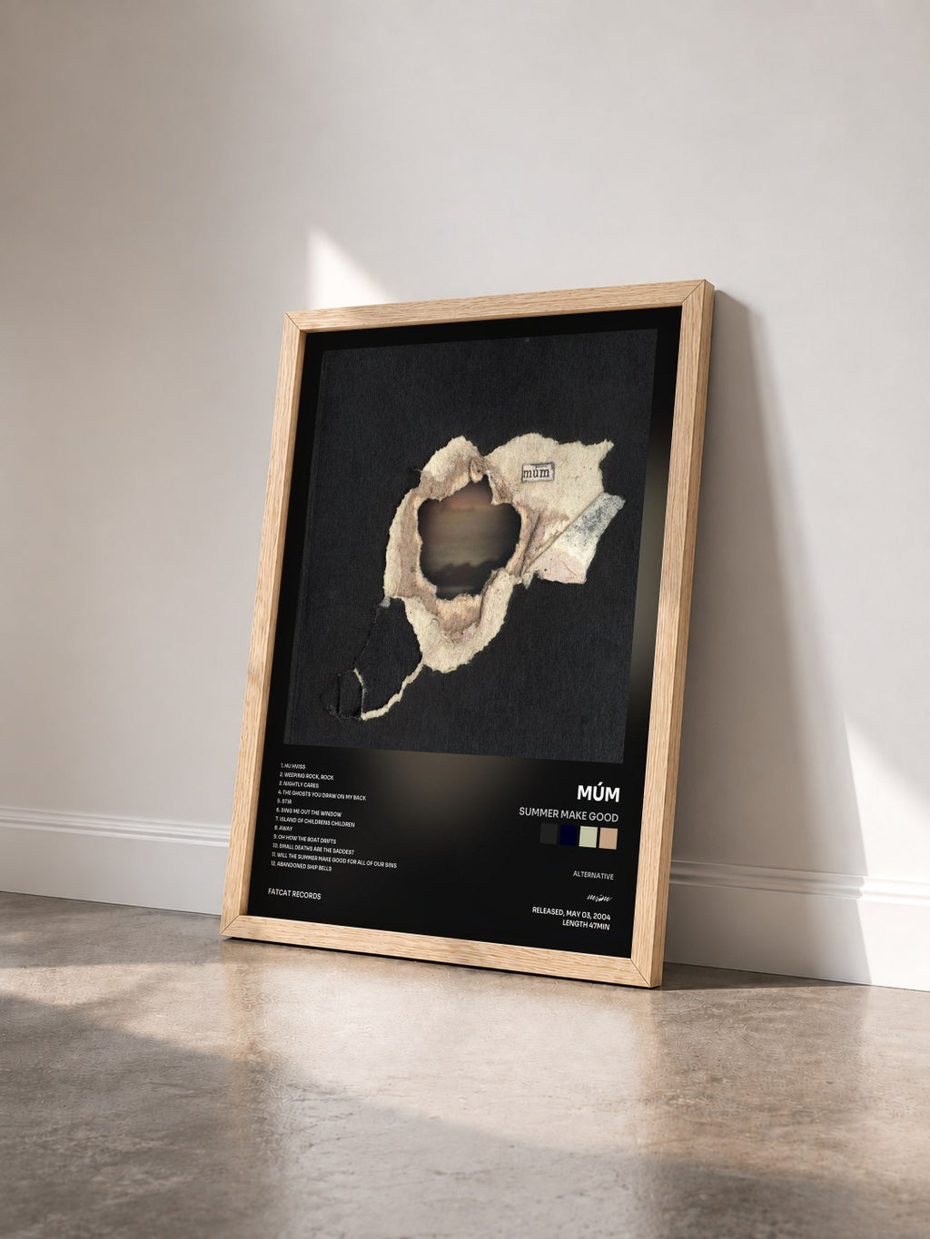 #bois Tableau de l'album Summer Make Good de múm vu de trois quarts, cadre en bois brut