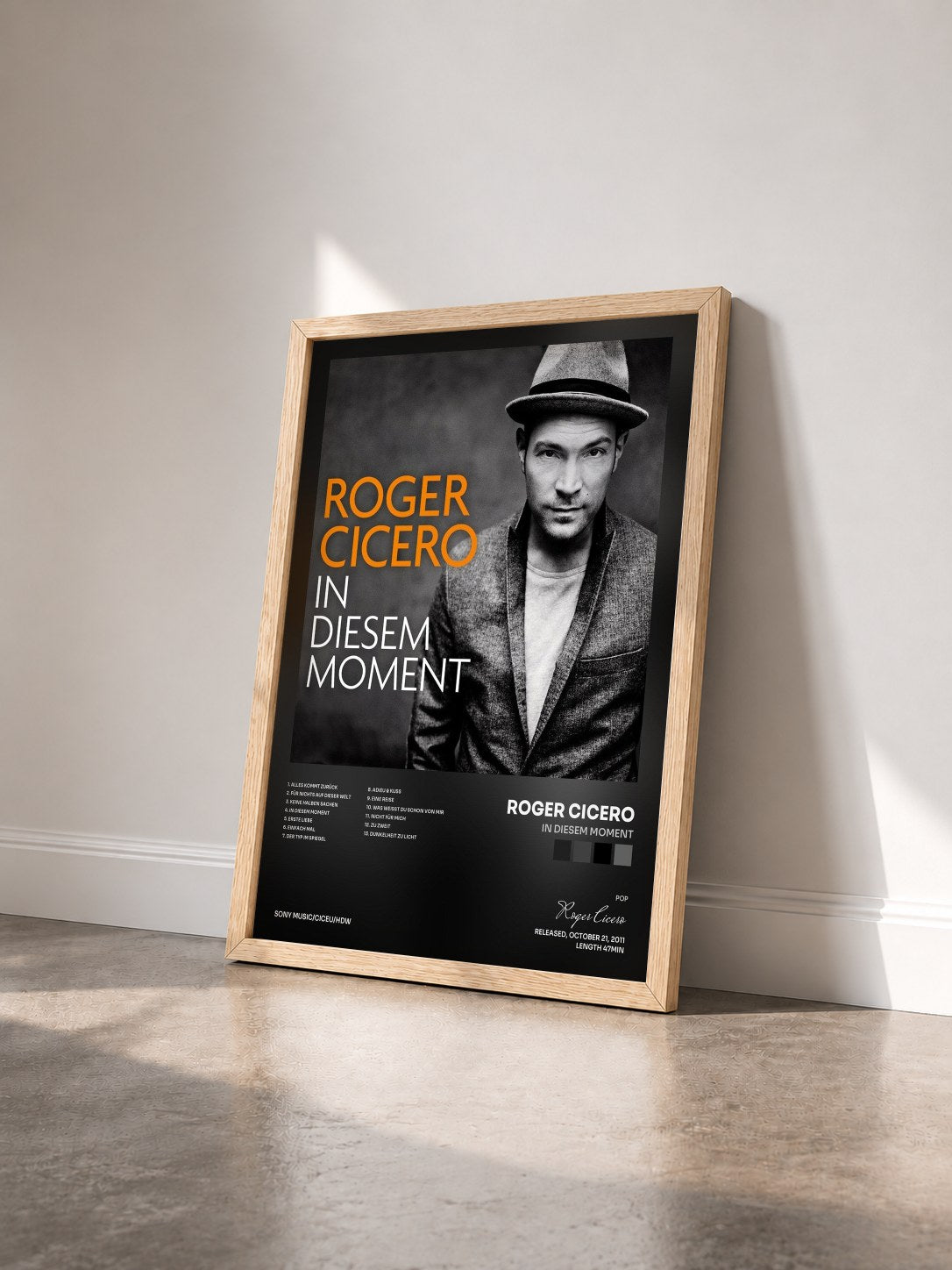 #bois Tableau de l'album In diesem Moment de Roger Cicero vu de trois quarts, cadre en bois brut