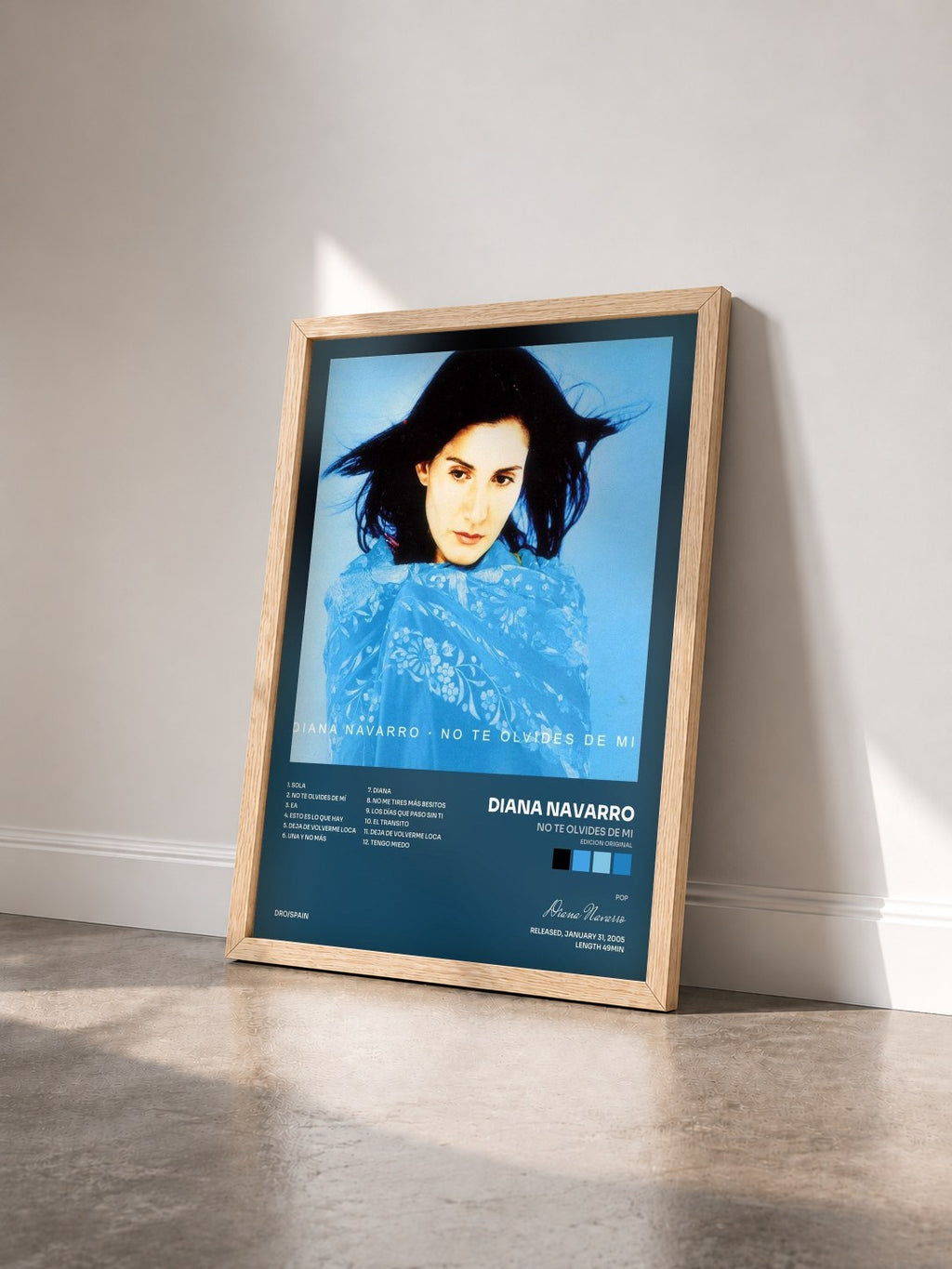 #bois Tableau de l'album No te olvides de mi (edicion original) de Diana Navarro vu de trois quarts, cadre en bois brut