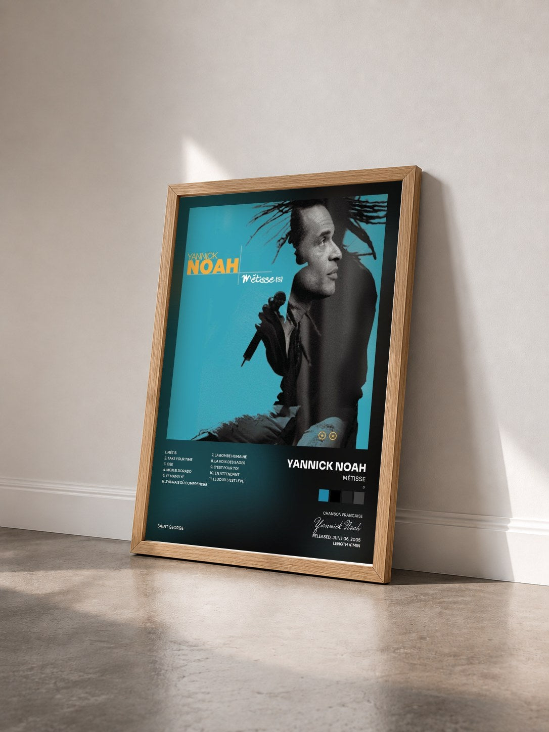 #bois Tableau de l'album Métisse(s) de Yannick Noah vu de trois quarts, cadre en bois brut