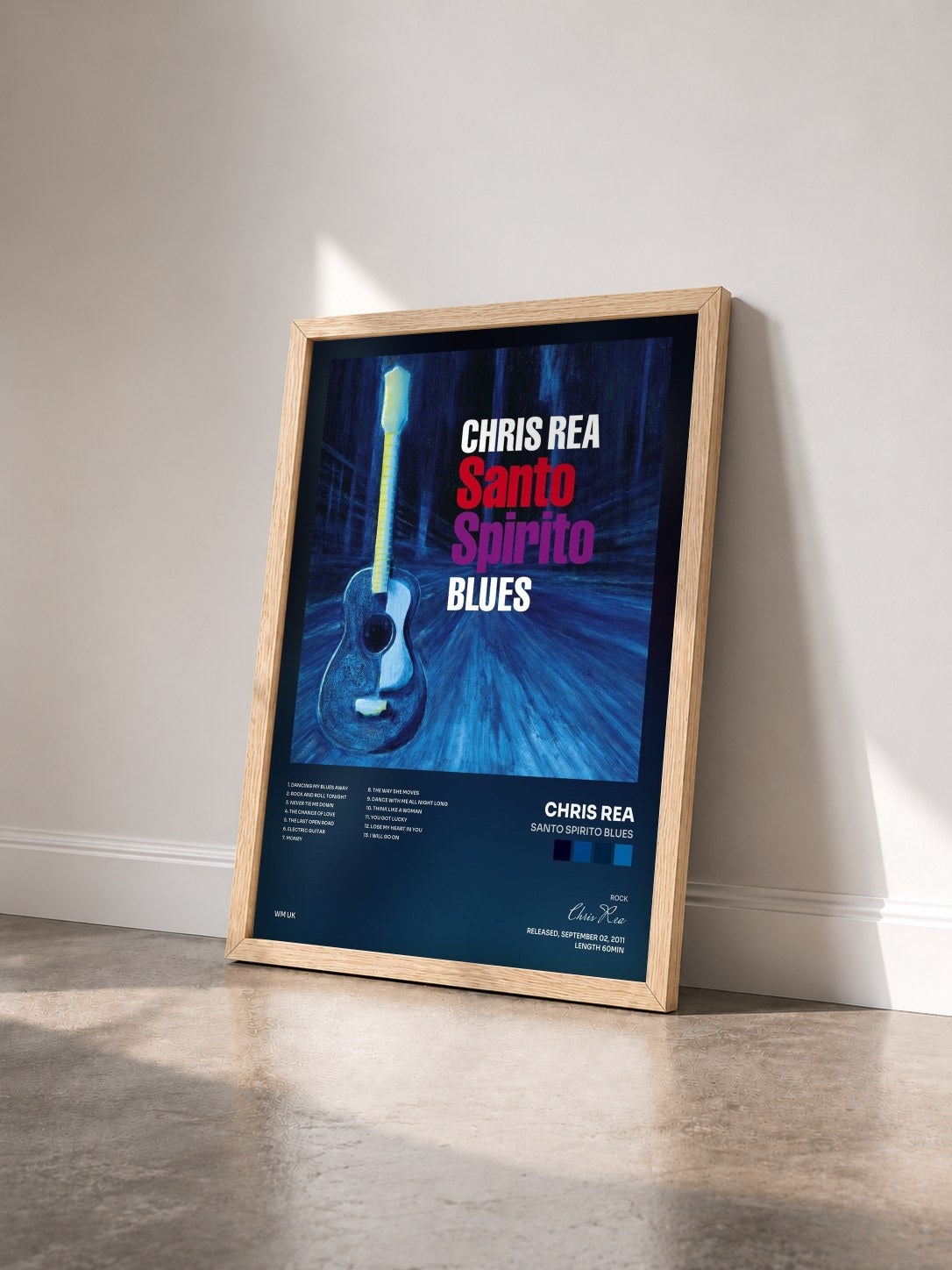 #bois Tableau de l'album Santo Spirito Blues de Chris Rea vu de trois quarts, cadre en bois brut