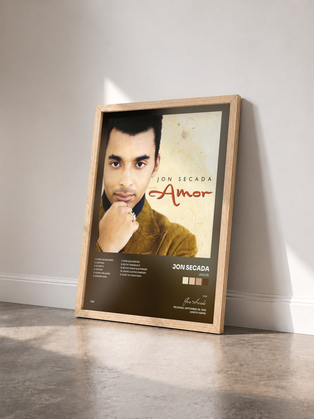 #bois Tableau de l'album Amor de Jon Secada vu de trois quarts, cadre en bois brut