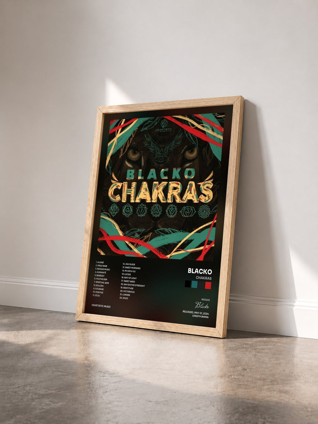 #bois Tableau de l'album Chakras de Blacko vu de trois quarts, cadre en bois brut