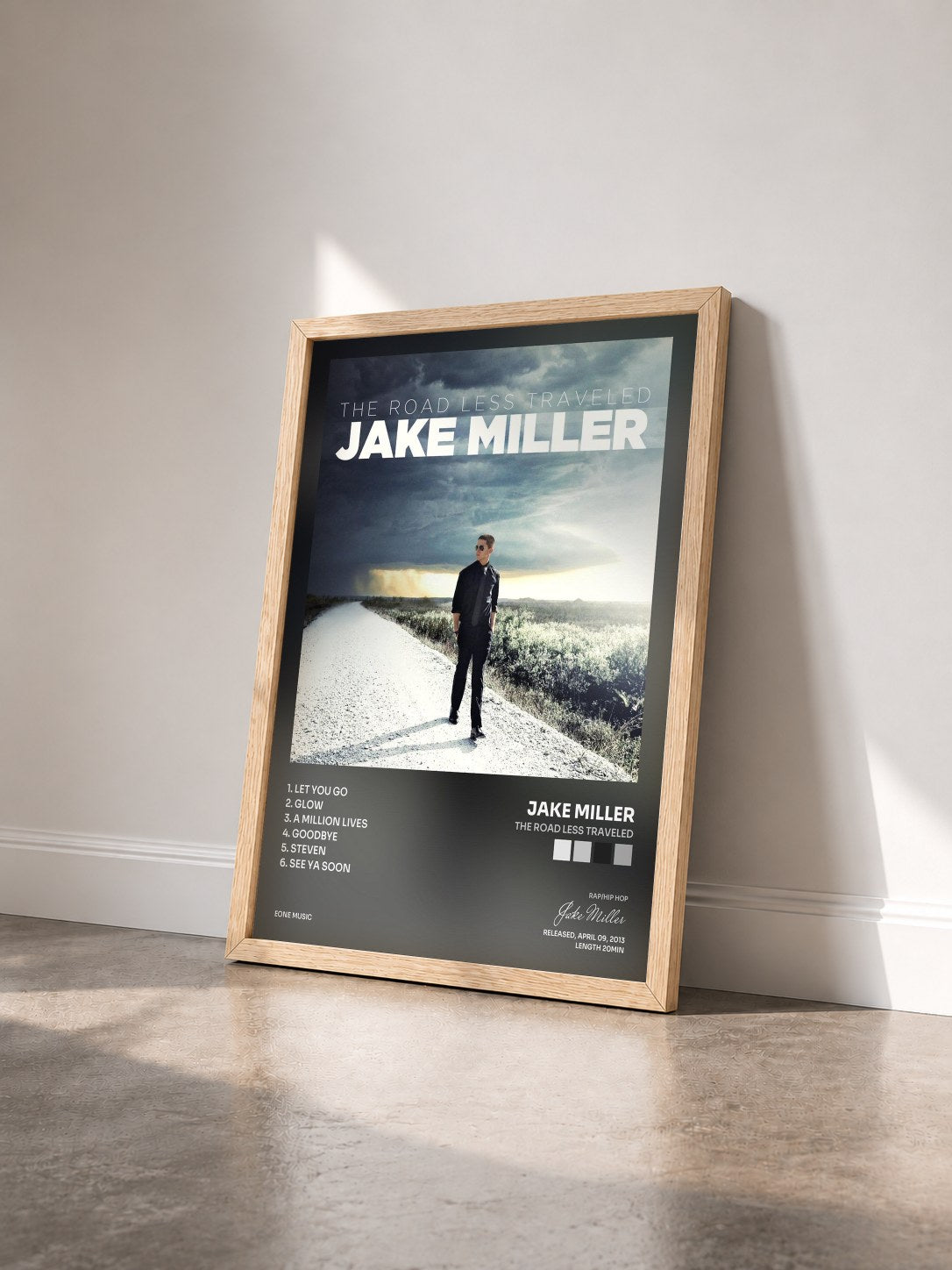 #bois Tableau de l'album The Road Less Traveled de Jake Miller vu de trois quarts, cadre en bois brut