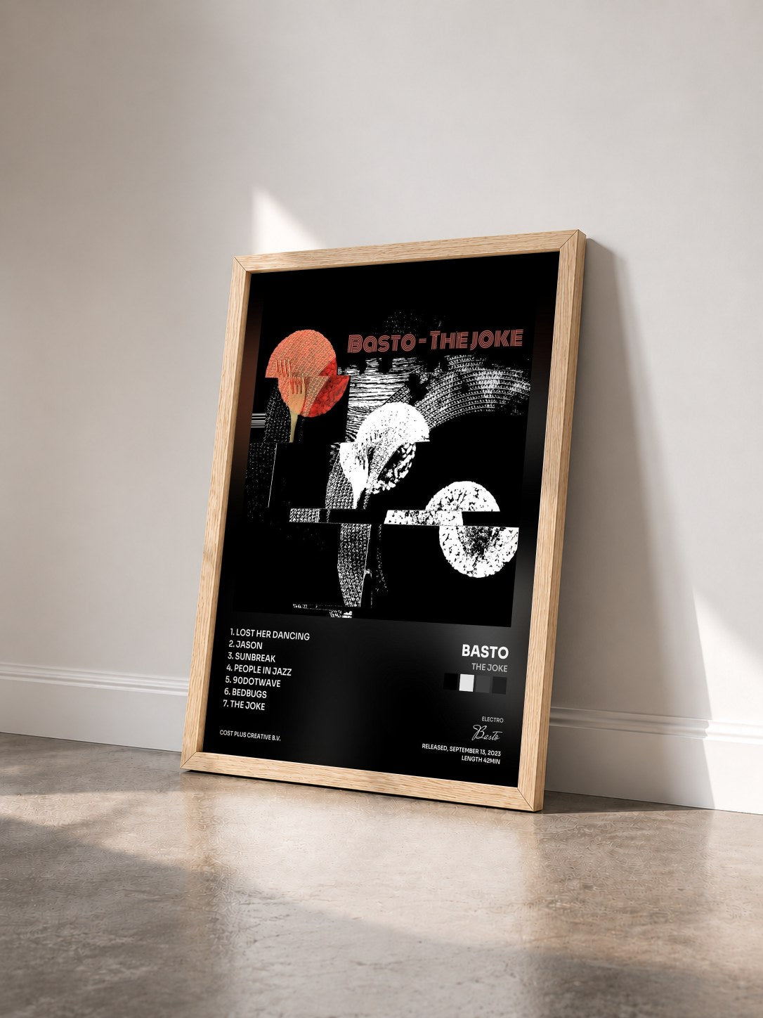 #bois Tableau de l'album The Joke de Basto vu de trois quarts, cadre en bois brut