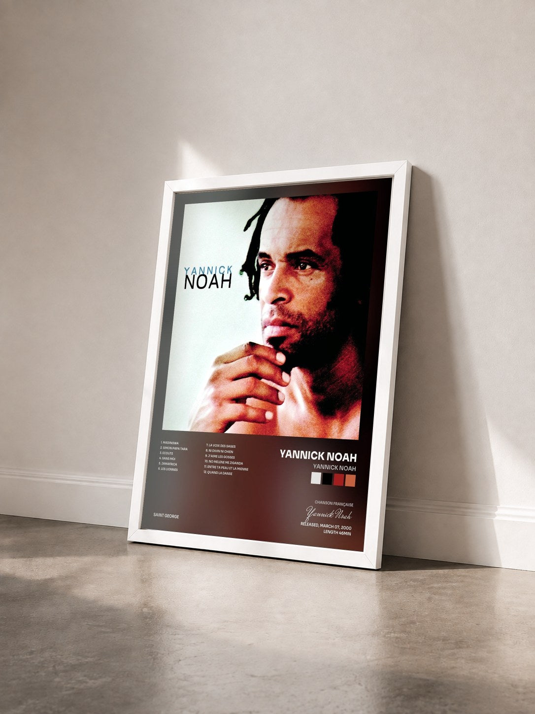 #blanc Tableau de l'album Yannick Noah de Yannick Noah vu de trois quarts, cadre blanc
