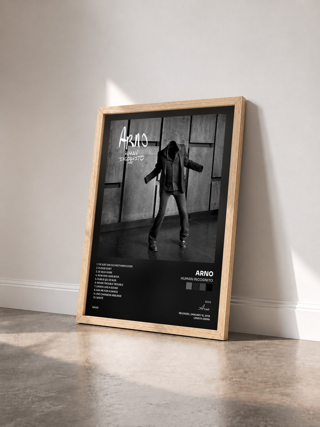 #bois Tableau de l'album Human incognito de Arno vu de trois quarts, cadre en bois brut