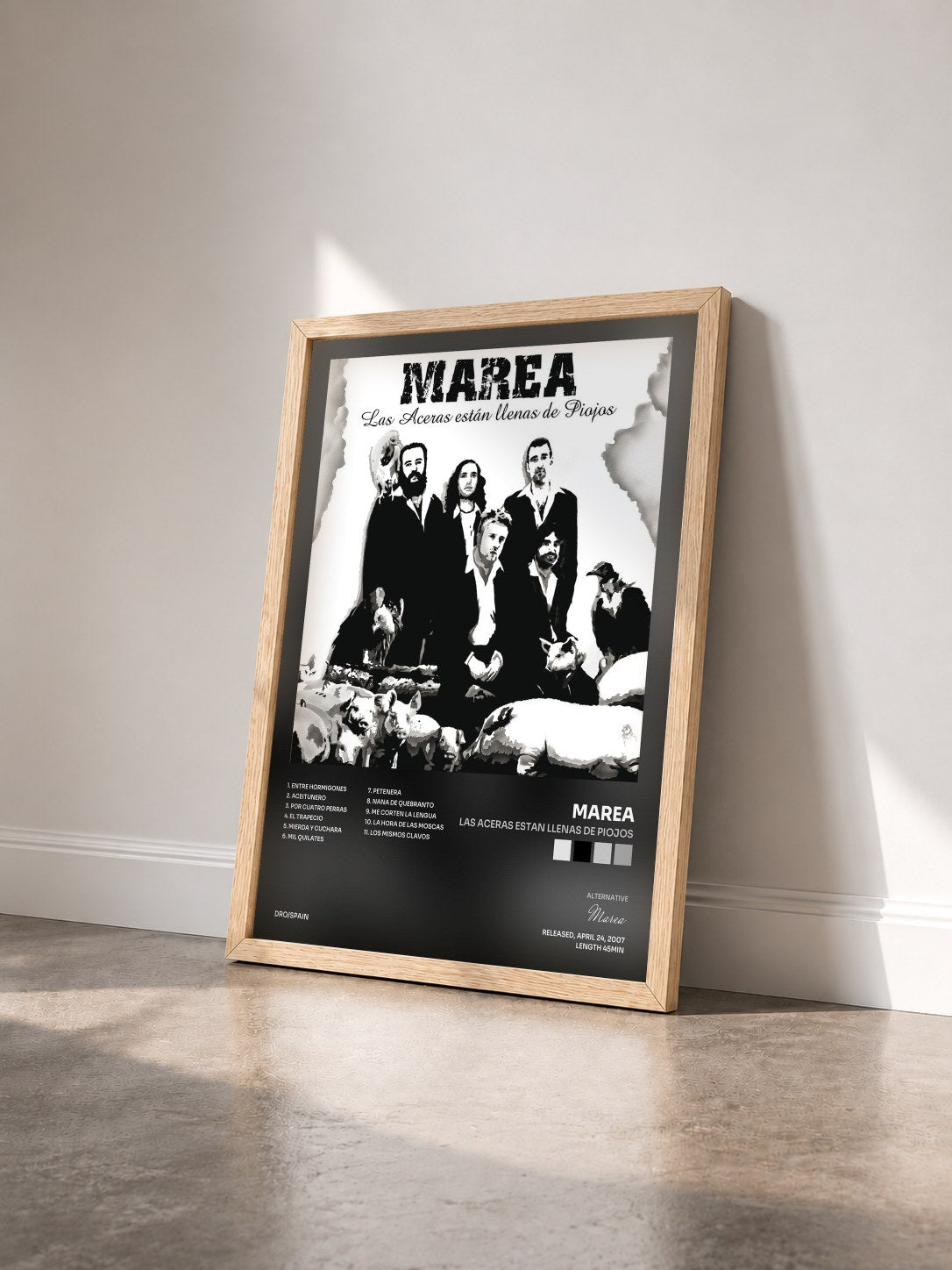 #bois Tableau de l'album Las aceras estan llenas de piojos de Marea vu de trois quarts, cadre en bois brut