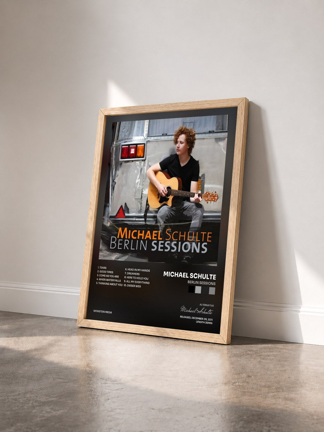 #bois Tableau de l'album Berlin Sessions de Michael Schulte vu de trois quarts, cadre en bois brut