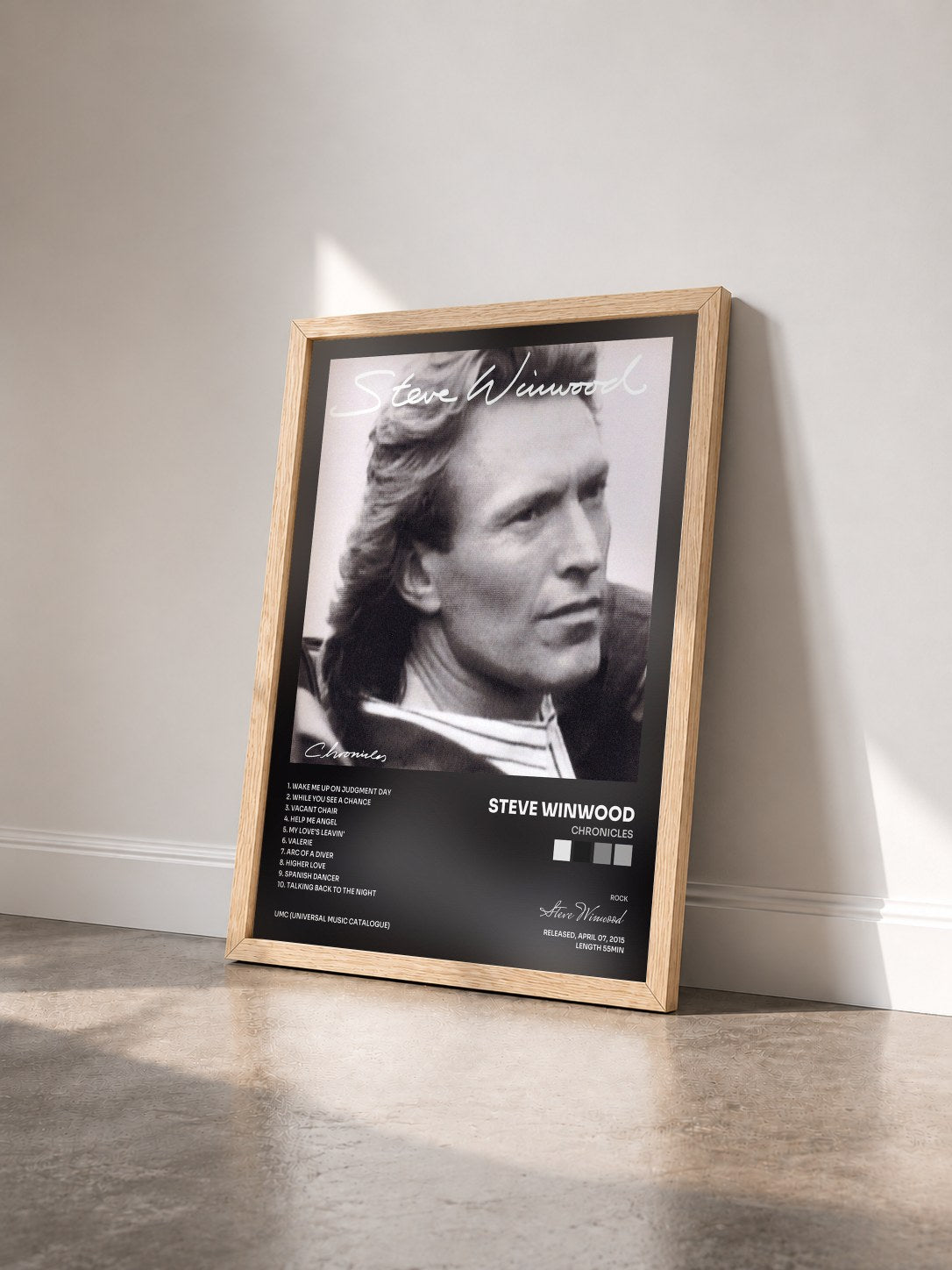#bois Tableau de l'album Chronicles de Steve Winwood vu de trois quarts, cadre en bois brut