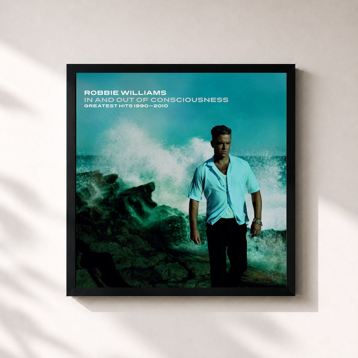 Robbie Williams · In And Out Of Consciousness: Greatest Hits 1990 - 2010