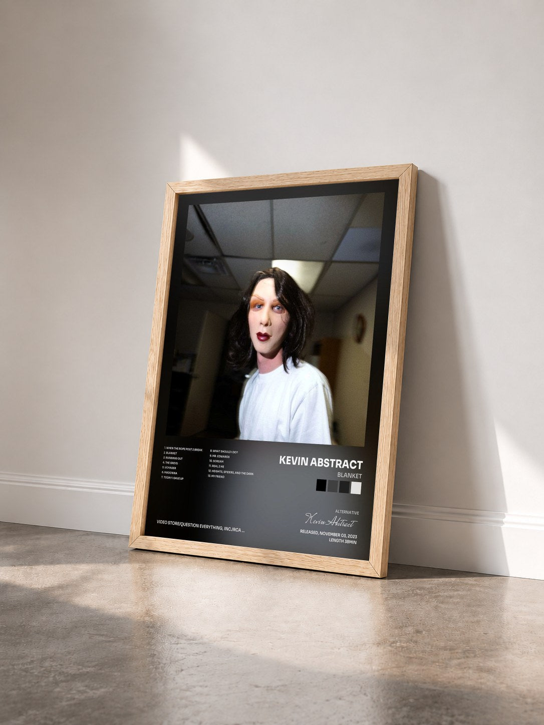 #bois Tableau de l'album Blanket de Kevin Abstract vu de trois quarts, cadre en bois brut