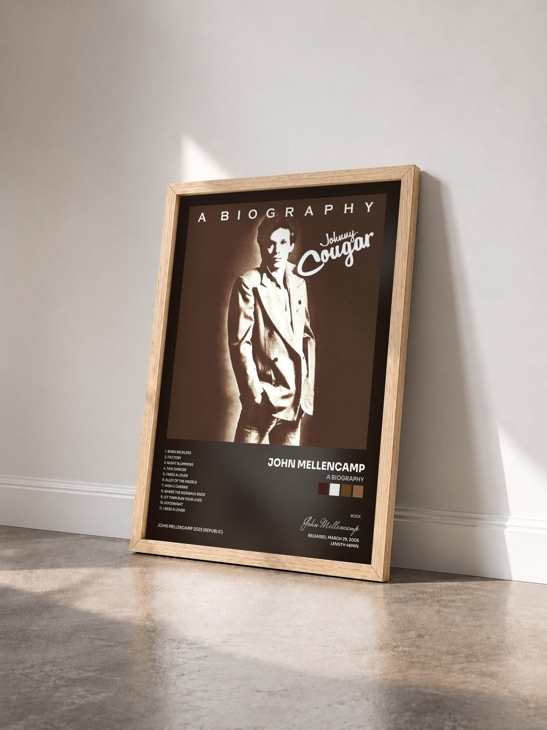 #bois Tableau de l'album A Biography de John Mellencamp vu de trois quarts, cadre en bois brut
