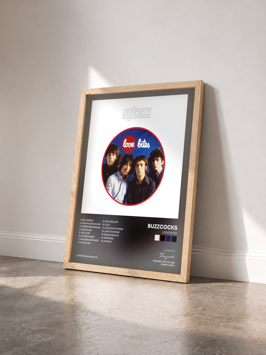 #bois Tableau de l'album Love Bites de Buzzcocks vu de trois quarts, cadre en bois brut