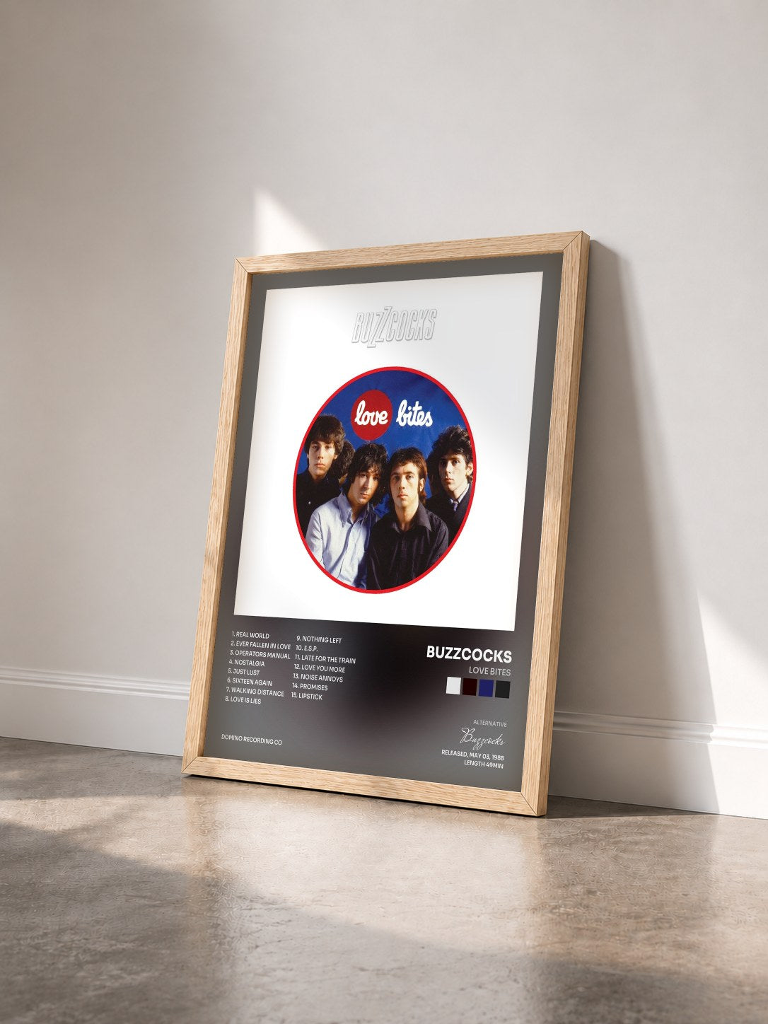 #bois Tableau de l'album Love Bites de Buzzcocks vu de trois quarts, cadre en bois brut