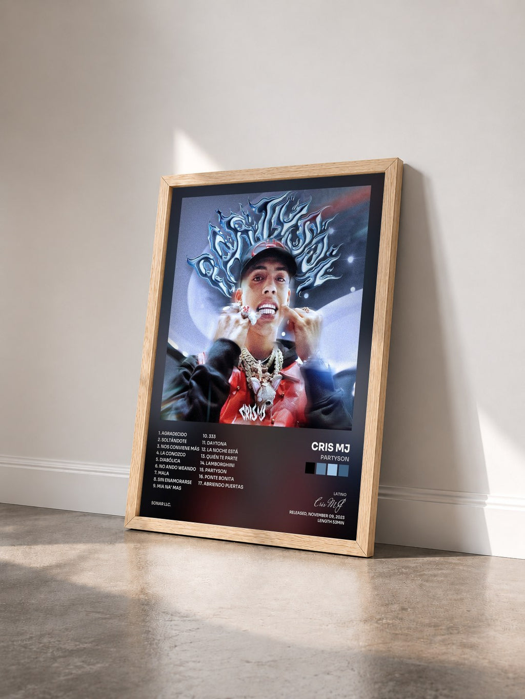 #bois Tableau de l'album Partyson de Cris MJ vu de trois quarts, cadre en bois brut