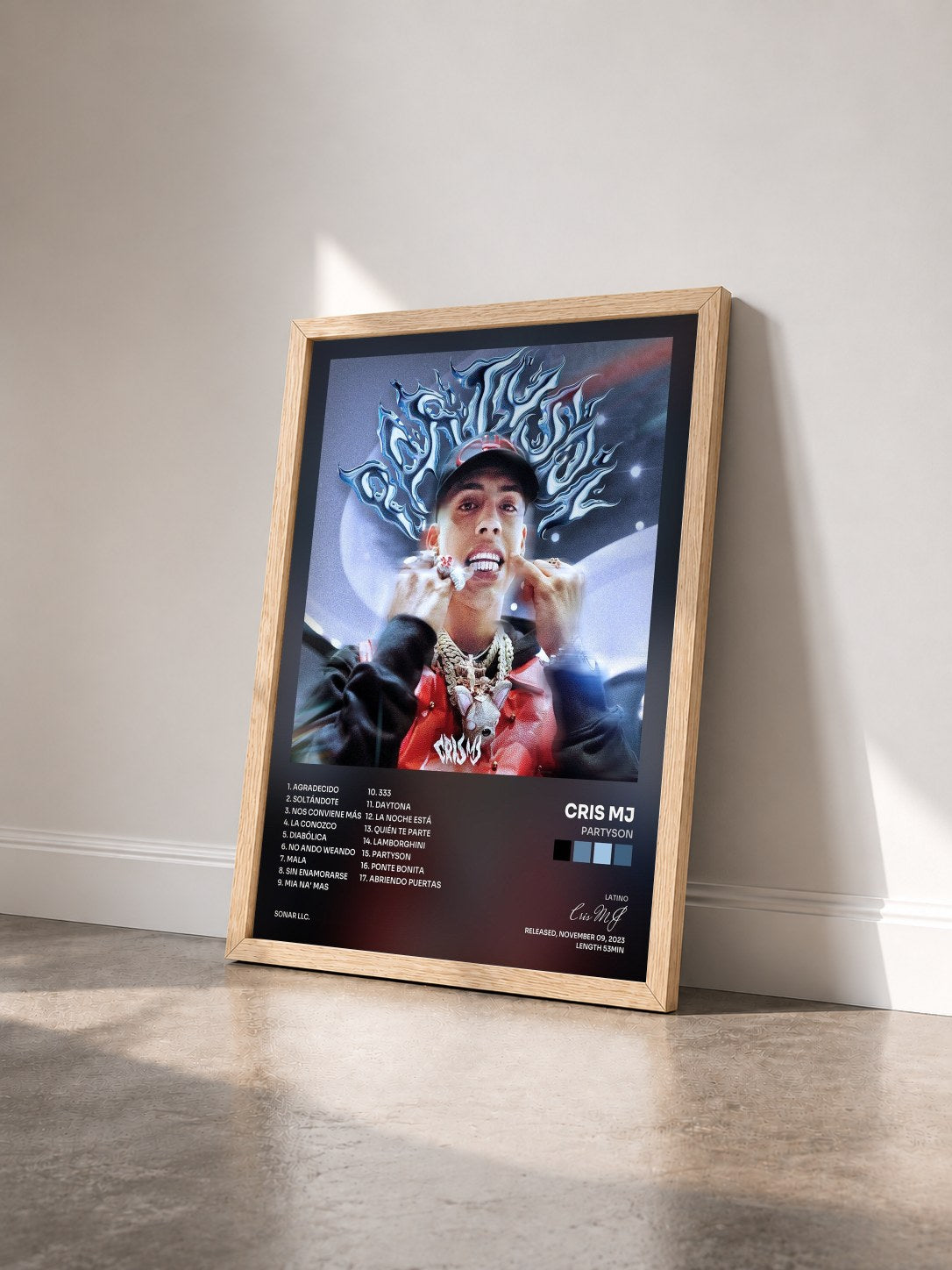 #bois Tableau de l'album Partyson de Cris MJ vu de trois quarts, cadre en bois brut