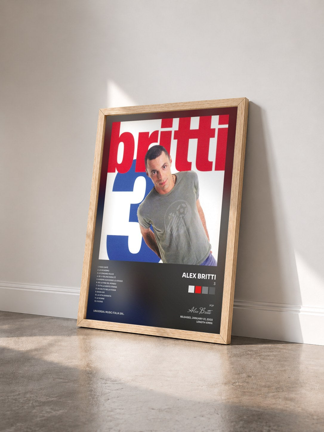 #bois Tableau de l'album 3 de Alex Britti vu de trois quarts, cadre en bois brut