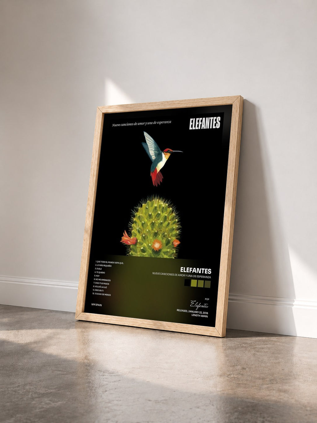 #bois Tableau de l'album nueve canciones de amor y una de esperanza de Elefantes vu de trois quarts, cadre en bois brut