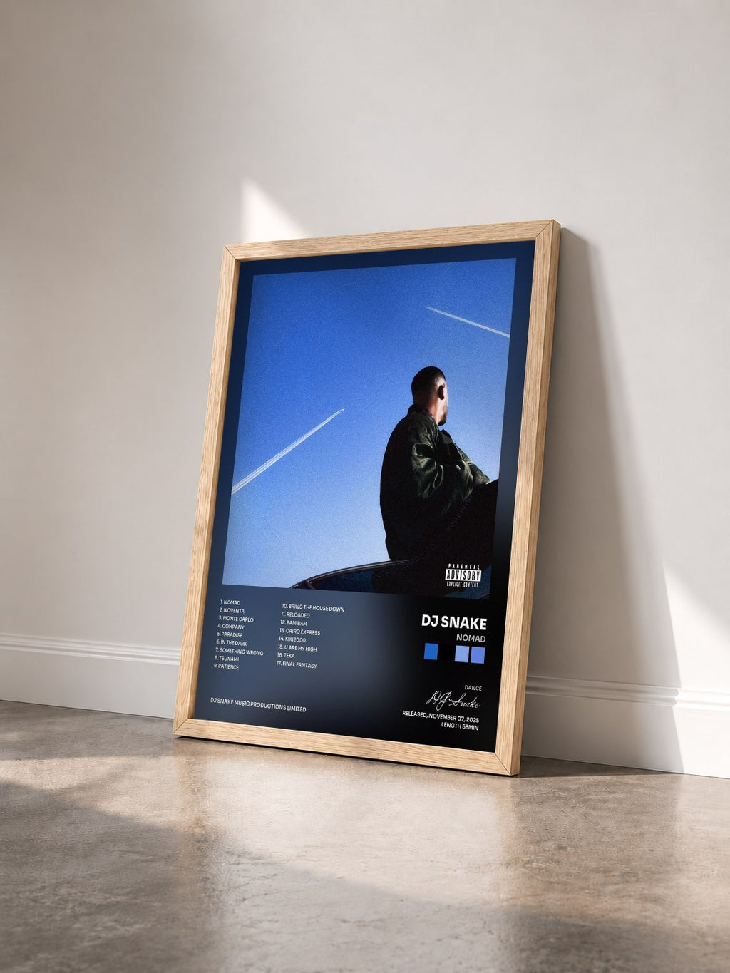 #bois Tableau de l'album Nomad de DJ Snake vu de trois quarts, cadre en bois brut