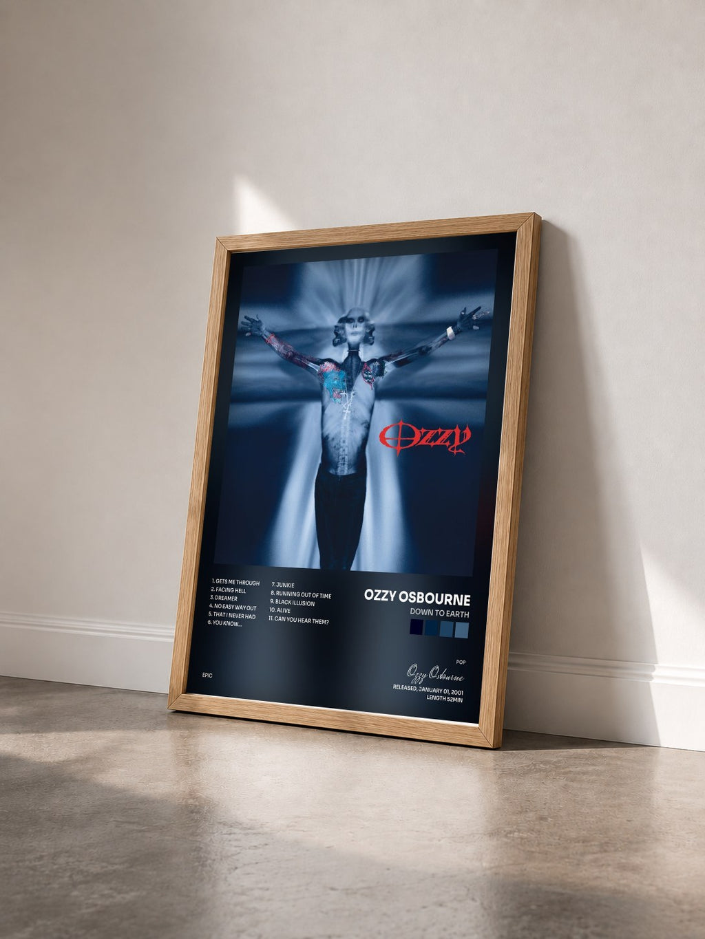#bois Tableau de l'album Down To Earth de Ozzy Osbourne vu de trois quarts, cadre en bois brut